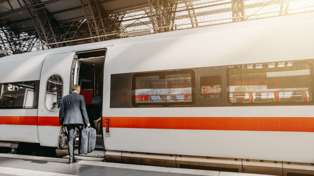 Business man boarding train